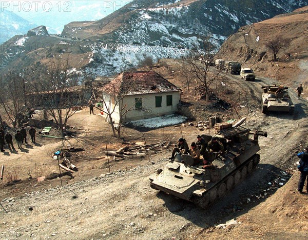 A paratroop regiment pictured during a hard 4-day march from the dzheirakh gorge in ingush republic to the argun gorge in chechnya along a new road to the mountain chechen village of itum-kale on the border with georgia built by military engineers in the rocky terrain in a short time, chechnya, russia, february 29, 2000.
