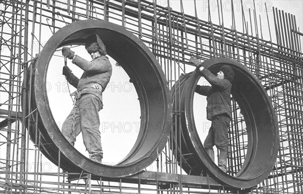 Kiev region, ukrainian ssr, ussr, construction of the chernobyl nuclear power plant, fitters n, shcherban and b, troitsky, july 1, 1975.