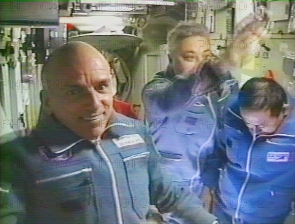Moscow, russia, april 30, 2001, (r-l) commander talgat musabayev, flight engineer yuri baturin and first space tourist u,s, national dennis tito have passed into the international space station on monday.