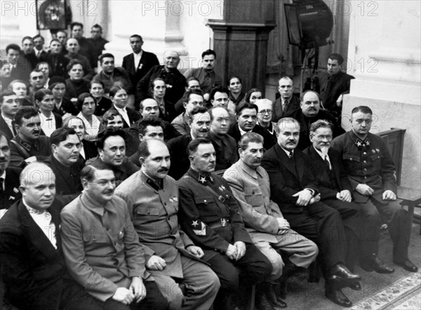 Moscow, ussr, 1936, josef stalin (front row, 4th from right) with other delegates of the 8th extraordinary all-union soviet congress, khrushchev is seated in the lower left corner, soviet communist party congress.