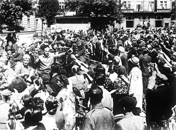 Population of pardubice, czechoslovakia welcome fighters of red army, world war 2, 1945.