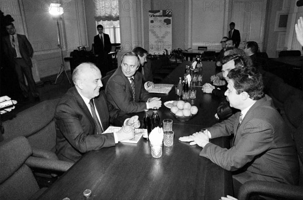 Ex-president of ussr mikhail gorbachev meets with i, baskin, a representative of the board of directors of the tikhnokhim company, april 25th, 1994, future president of russia, vladimir putin, sits on gorbachev's right.
