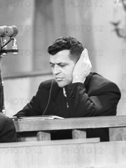 U2 spy plane pilot francis gary powers sits in the dock listening to a translation of the proceedings at his moscow trial, august 1960, ussr.