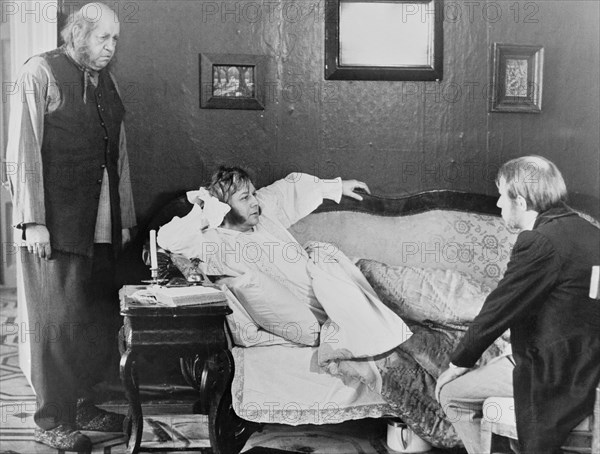 A still from the mosfilm studios production of 2 part film, 'a few days in the life of i, i, oblomov' directed by nikita mikhailov and based on the novel oblomov by ivan a, goncharov, zakhar (left) played by people's artist of the ussr, andrei popov and oblomov (center) played by people's artist oleg tabakov, 1980.