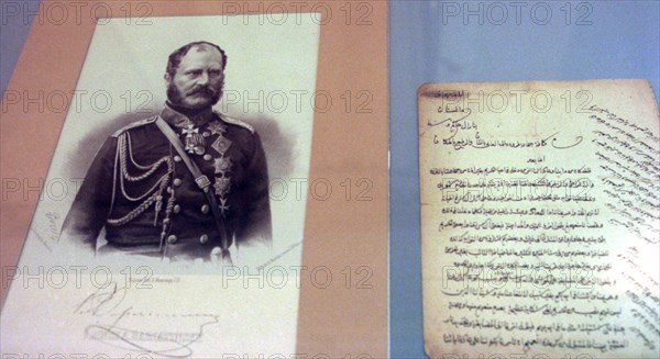 Left: general fieldmarshal alexander baryatinsky, hero of the caucasian war of 1817-1864, right: some original letters of iman shamil, the 19th-century chechen religious and political leader, who baryatinsky captured, on display at museum exhibition illustrating the 30-year caucasian war including number of shamil's letters addressed to baryatinsky, shamil was later a guest in baryatinsky's maryino estate in the kursk region, (photo itar-tass)  .