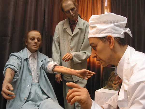 Headline: wax figures exhibition 'on the brink' caption: tas19: moscow, russia, april 18, 2003, the composition in the doctor's study (in pic), the st,petersburg museum of wax figures opened the exhibition 'on the brink' to show the destructive influence of narcotics,(photo itar-tass / andrei kuzin) .