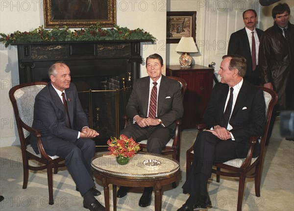 Mikhail gorbachev meeting with ronald reagan and george bush during his visit to the usa in 1987.