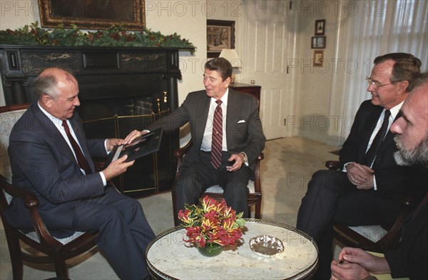 Mikhail gorbachev meeting with ronald reagan and george bush during his visit to the usa in 1987.