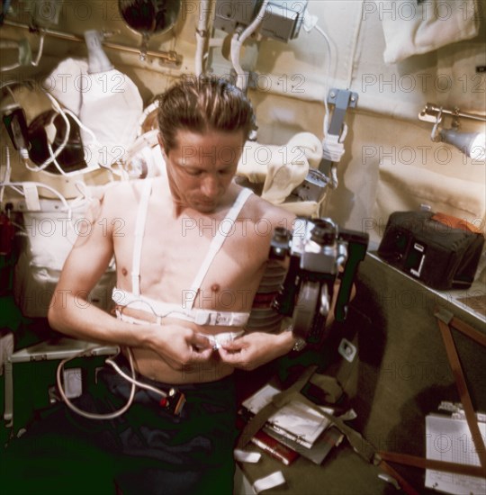 Soyuz 22, soviet cosmonaut vladimir aksyonov during medical belt experiment, 1976.