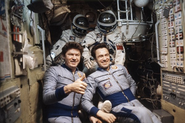 Soviet cosmonauts valery ryumin (left) and leonid popov, crew of the soyuz 35 mission, aboard the salyut 6 space station, april 1980.