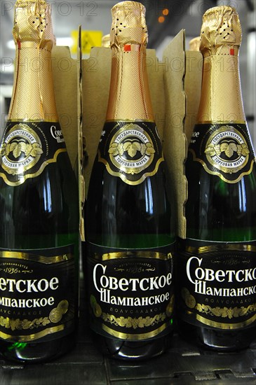 Moscow, russia, november 29, 2010, bottles of sovetskoye shampanskoye being packed in boxes at kornet, a moscow-based champagne winery.