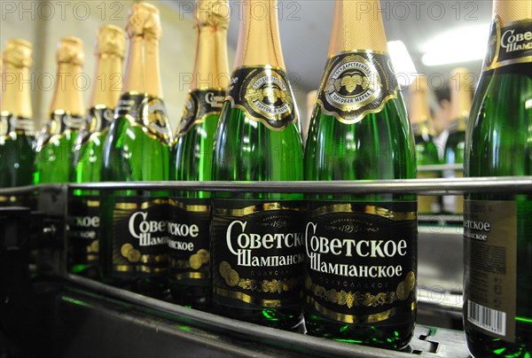 Moscow, russia, november 29, 2010, sovetskoye shampanskoye bottling line at kornet, a moscow-based champagne winery.