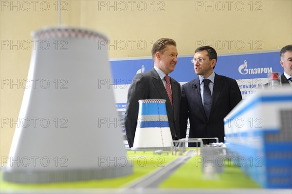 St petersburg, russia, april 8, 2011, gazprom ceo alexei miller, boris vajnzikher (vainzikher), tgc-1 general director, chairman of st, petersburg heating grid board of directors, l-r, attend the launch ceremony of the new ccgt-450 (combined cycle gas turbine) unit at the yuzhnaya (chp) cogeneration thermal power plant owned by power generating company tgc-1.