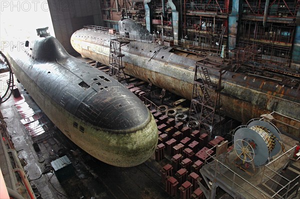 Murmansk region, russia, august 10,2006, a view of the first soviet k3 submarine i`leninsky komsomoli^, background, which is currently on berth at the nerpa ship-repairing plant, navy museum exhibits will be placed on display in the submarine.