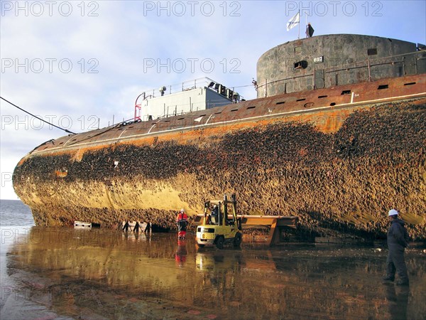 Murmansk region, russia, september 08, 2006, the decommissioned nuclear-powered submarine k-60 with a reactor aboard is transported on the dockwise (dutch heavy lift shipping company) semi-submersible vessel transshelf from the gremikha naval base to polyarny town for dismantling, the project is sponsored by norway and canada.