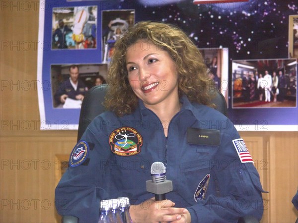 Baikonur, kazakhstan, september 17, 2006, american space tourist anousheh ansari smiles for a photo, the 14th iss crew is to launch from the baikonur cosmodrome on september 18, the tma 9 spacecraft is on the launch pad at the baikonur cosmodrome.