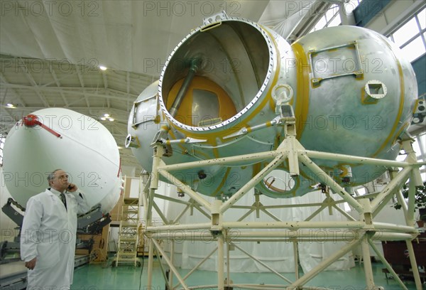 Chief designer of fregat-grunt vladimir asyushkin stands near the fregat upper stage in an assembly shop of the federal state unitary enterprise (fgup) lavochkin research and production association (npo), moscow region, russia, january 17, 2007.