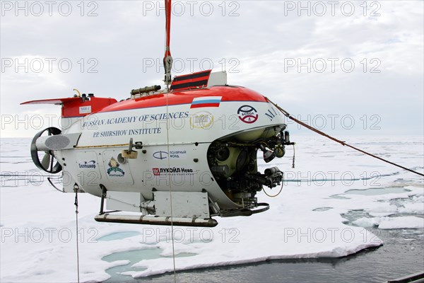 Arctic ocean, august 8, 2007, mir-1 submersible is being descent from the akademik fedorov research ship during the russian polar expedition 'arctic-2007'.