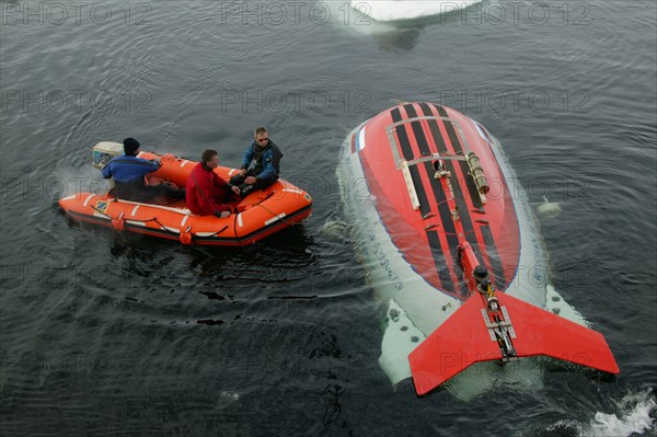 Arctic ocean, august 8, 2007, mir-1 submersible is being descent from the akademik fedorov research ship during the russian polar expedition 'arctic-2007'.