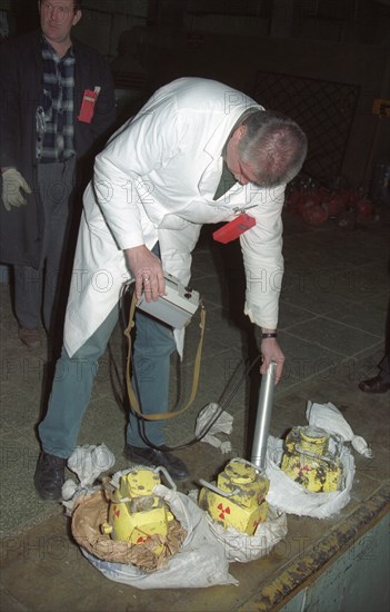 Yekaterinburg, russia, november 13, an expert seen measuring the radiation level of three containers which had been stolen at an enterprise in sverdlovsk region (the urals) by two criminals who were arrested by the local police during in an attempt to sell the dangerous articles, by a preliminary estimation the gamma-radiation level of the containers exceeds the standard safe rate by 2,000 times.