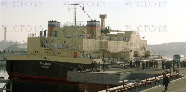 Maritime territory, russia, november 22 2001: unique floating complex for liquid nuclear waste reprocessing 'landysh' (lilly of the valley) seen moored to the quay of plant 'zvezda' (star) specializing in salvaging of nuclear submarines, the complex is operational thanks to efforts of russian and japanese authorities to prevent pollution of the sea of japan with nuclear waste.