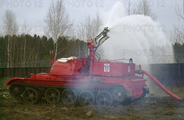 Moscow region, russia, november 21 2002: remote controled tank for fighting fires (in pic) was shown today at the demonstration exercises for the top officials of the territorial divisions of the emergency situation ministry, the exercises took place at the testing range in balashikha, (photo yuri mashkov).