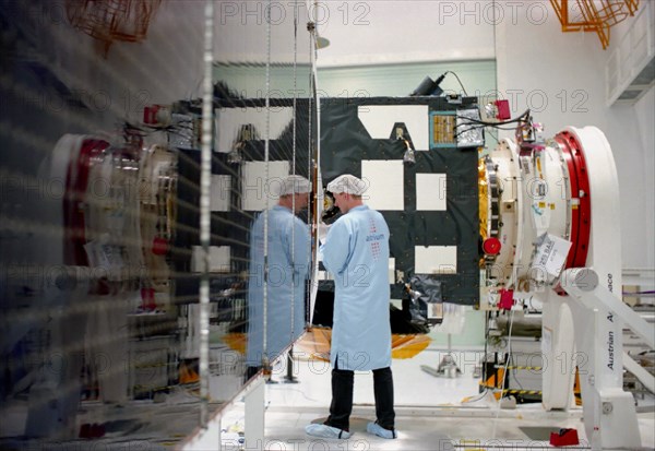 caption: tas05: kazakhstan, may 23, 2003, european specialisnts (in pic) during the preparation of 'mars-express' space shuttle's launch scheduled for june, 2, 2003, (photo itar-tass / sergei kazak) .