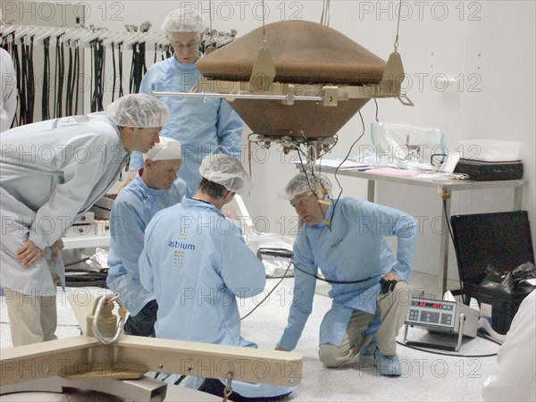 Baikonur, kazakhastan, may 26, 2003, specialists preparing the beagle 2 lander as part of the european space agency's mars express mission to be launched on june 2, 2003 on soyuz-fg booster.
