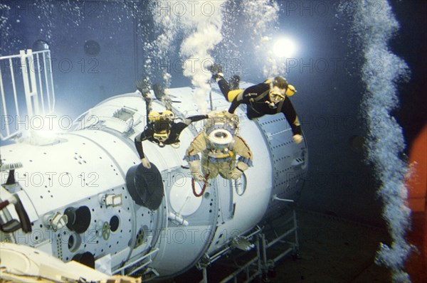 International space station, members of 3rd back up crew training in hydrolab, 5/01.
