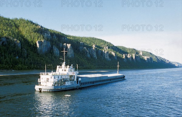 A cargo ship on the lena river in yakutia, siberia, russia.