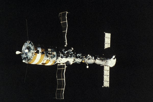 Soviet spacecraft soyuz t-5 docked to the salyut 7 space station.