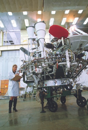 A tv broadcasting satellite in assembly.