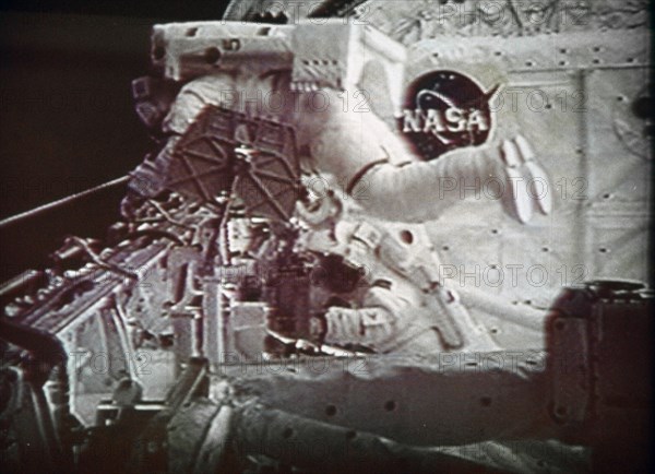Mir 10/97: space walk to repair mir, us astronaut scott parazinsky examines damage to mir craft.