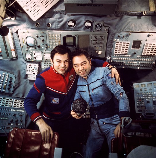 Soviet cosmonauts yuri romanenko (left) and georgi grechko aboard the salyut 6 space station, docked with soyuz 26 and 27, 1978.