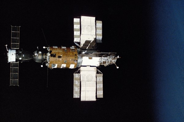 Soviet spacecraft soyuz t-14 docked to the salyut 7 space station after undocking with the soyuz t-13 cargo craft, november 1985, photo taken from soyuz t-13.