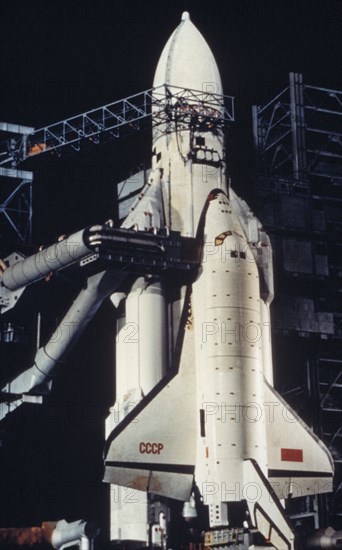 Soviet space shuttle buran with the energia carrier rocket on the launch pad at baikonur in kazakhstan, ussr, october 1988.