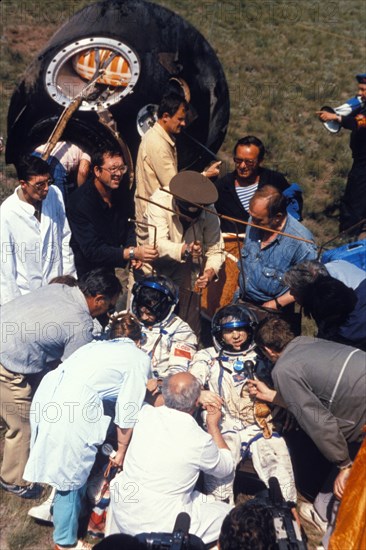 Soyuz tm-9, soviet cosmonauts aleksandr balandin and anatoly solovyov return from the mir space station, 1990.