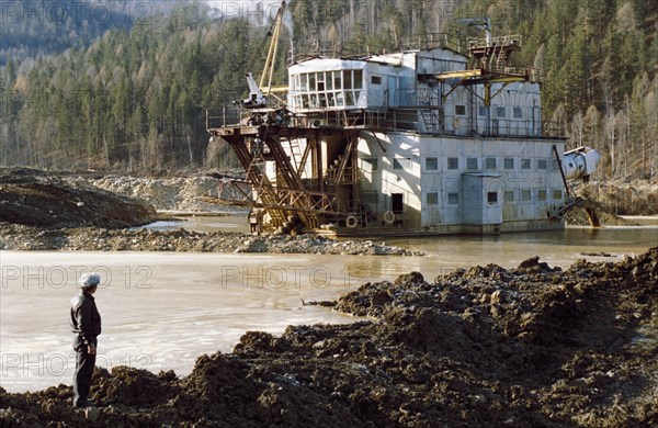 A gold mining dredger in the chita region of siberia, 1990s.