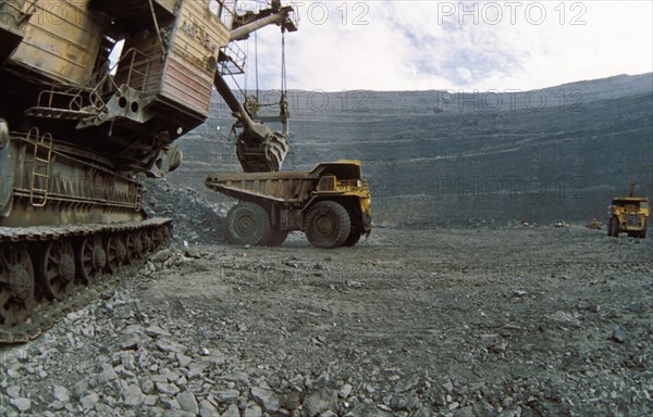 Excavation of diamonds at the udachny pit mine in yakutia, 1990s.