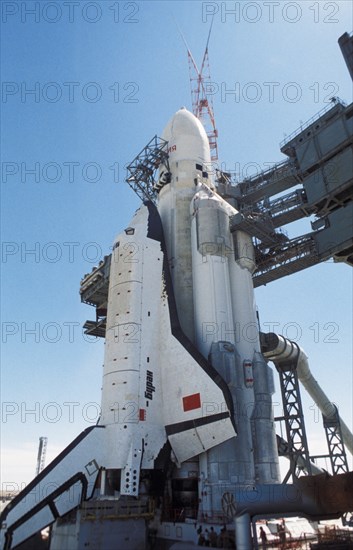 Soviet space shuttle buran with the energia carrier rocket on the launch pad at baikonur in kazakhstan, ussr, 1988.