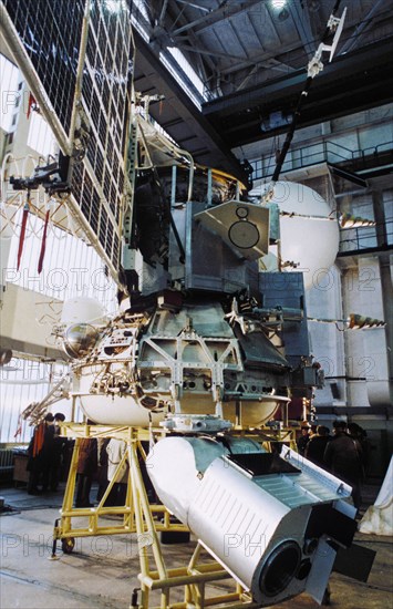 The soviet space probe vega 1 or 2 in the assembly and testing shop, the bottom of the platform carries video cameras, 1984, the international project included specialists from austria, bulgaria, czechoslovakia,frg, france, gdr, poland and ussr, it's mission, in addition to landing on venus, also included the first direct research of halley's comet.