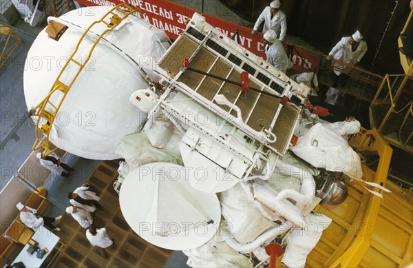 The soviet space probe vega 1 or 2 in the assembly and testing shop at the baikonur cosmodrome, 1984, the international project included specialists from austria, bulgaria, czechoslovakia,frg, france, gdr, poland and ussr, it's mission, in addition to landing on venus, also included the first direct research of halley's comet.