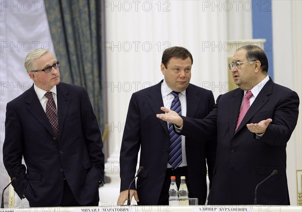 Moscow, russia, october 21, 2009, president of the russian union of industrialists and entrepreneurs alexander shokhin, chairman of the supervisory board of alfa group mikhail fridman, metalloinvest main shareholder alisher usmanov (l-r) appear at a meeting with russian entrepreneurs in the kremlin.
