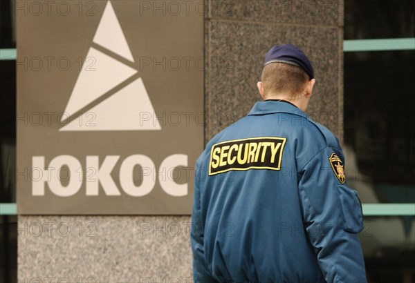 Moscow, russia, april 22, 2004, officials of the russian federal service for economic and tax crimes confiscated documents at the central office of the oil major yukos company.