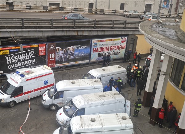 Moscow, russia, march 29, 2010, ambulances and rescue workers outside park kultury metro station, sokolnicheskaya line of the moscow underground, an explosion rocked the metro station at 8,40 during the rush hour killing more than ten passengers.