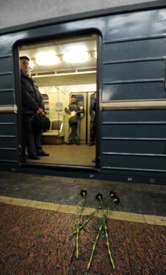 Moscow, russia, march 29, 2010, flowers lie at lubyanka metro station to commemorate victims of today’s suicide bombing, blasts rocked two stations on sokolnicheskaya line of the moscow underground during the rush hour killing 38 and injuring over 60 passengers.