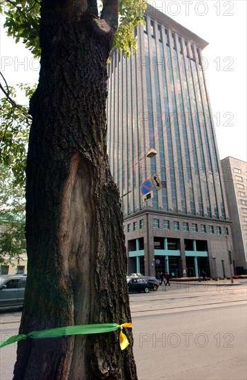 Moscow,russia, july 12, 2004, organizers of an action in support of 'yukos' decorated the poles along dubiniskaya street with yellow and green ribbons (the colours of the 'yukos' oil company).