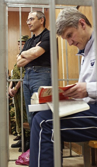 Moscow, russia, july 20, 2004, mikhail khodorkovsky (l) and platon lebedev (r) in the courtroom of meshchansky court that starts hearing the evidence of prosecution in khodorkovsky-lebedev case.