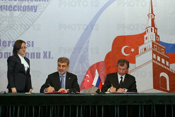 Kazan, russia, march 4, 2011, turkish energy minister taner yildiz and russian vice-prime minister igor sechin (l-r seated) during the signing ceremony at the 11th meeting of the russian-turkish interstate commission for trade and economic cooperation, the talks discussed gazprom's participation in the samsun-ceyhan pipeline project.