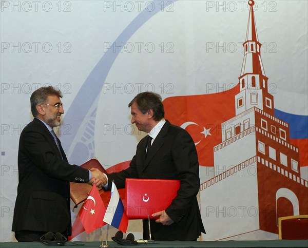 Kazan, russia, march 4, 2011, turkish energy minister taner yildiz (l) and russian vice-prime minister igor sechin shake hands during the signing ceremony at the 11th meeting of the russian-turkish interstate commission for trade and economic cooperation, the talks discussed gazprom's participation in the samsun-ceyhan pipeline project.